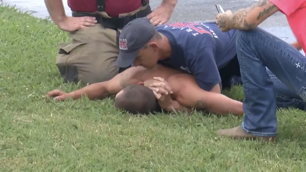 Firefighters Wrangle Man Who Attempted to Steal Firetruck While they Battled Blaze