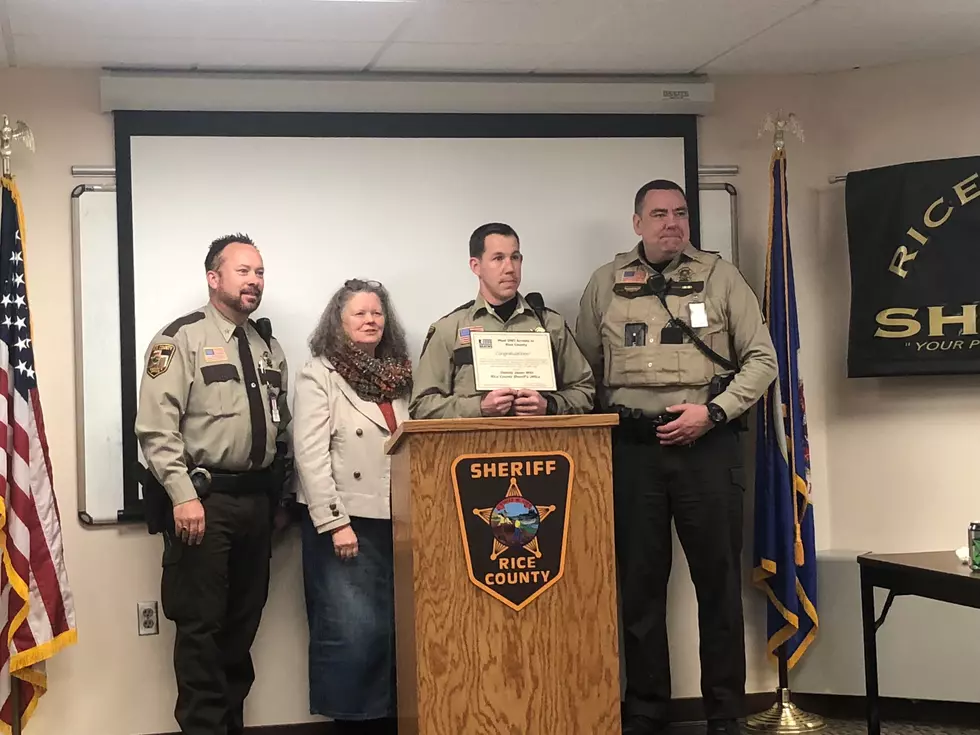 L to R Sheriff Troy Dunn, Kathy Cooper, Deputy Jason Witt, Sgt. Mark Hlady. Photo by Gordy Kosfeld