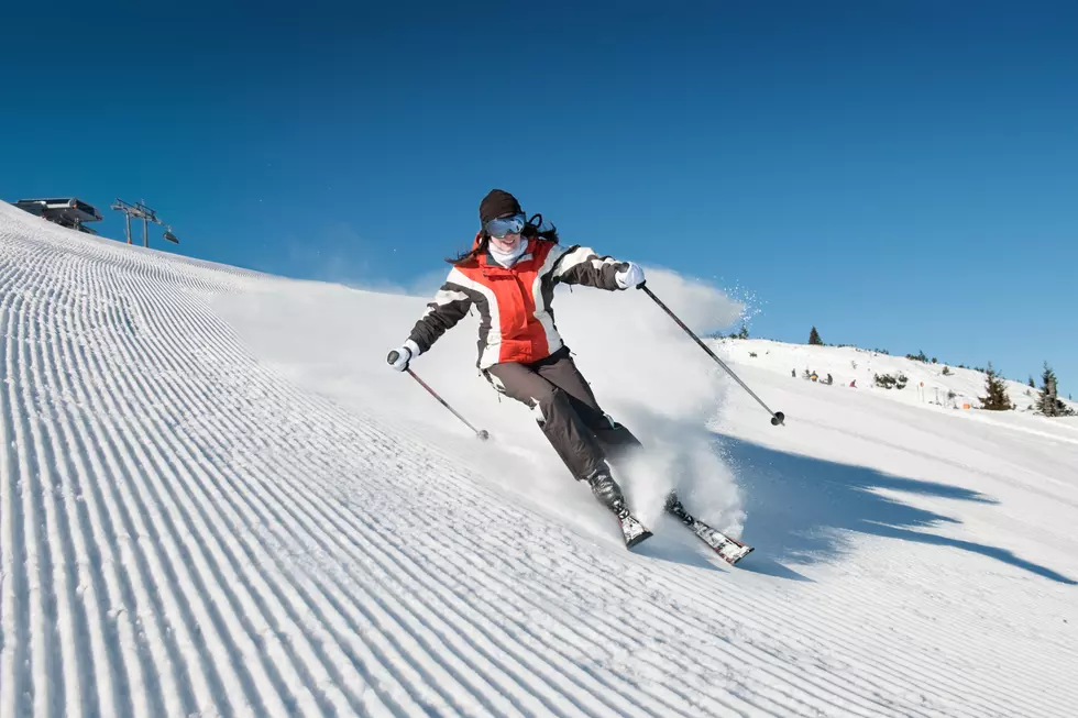 Skiing lady on modified piste